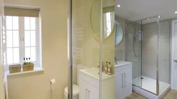 Shower, eco-friendly toiletries, hair dryer, towels