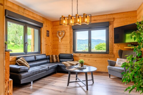 Chalet "Le Brusyna" avec vue sur montagne, bain à remous, terrasse privée et Wi-Fi