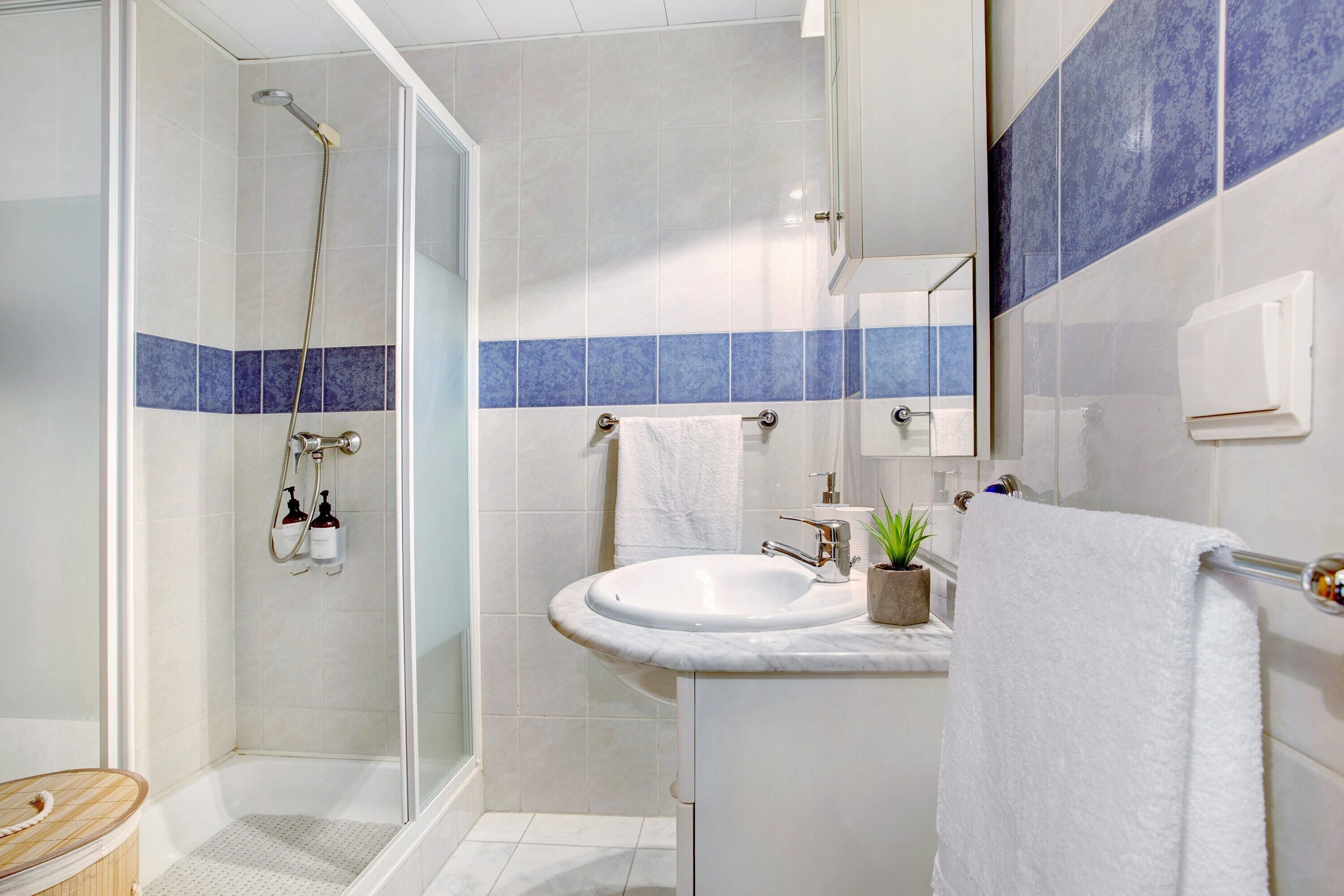 Bathtub, hair dryer, towels