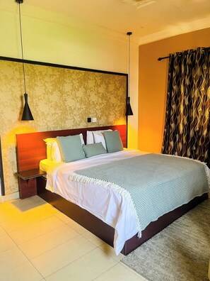 Junior Suite, 1 King Bed, Pool View | Free WiFi, bed sheets - RK Italian Boy Hotel (Accra)
