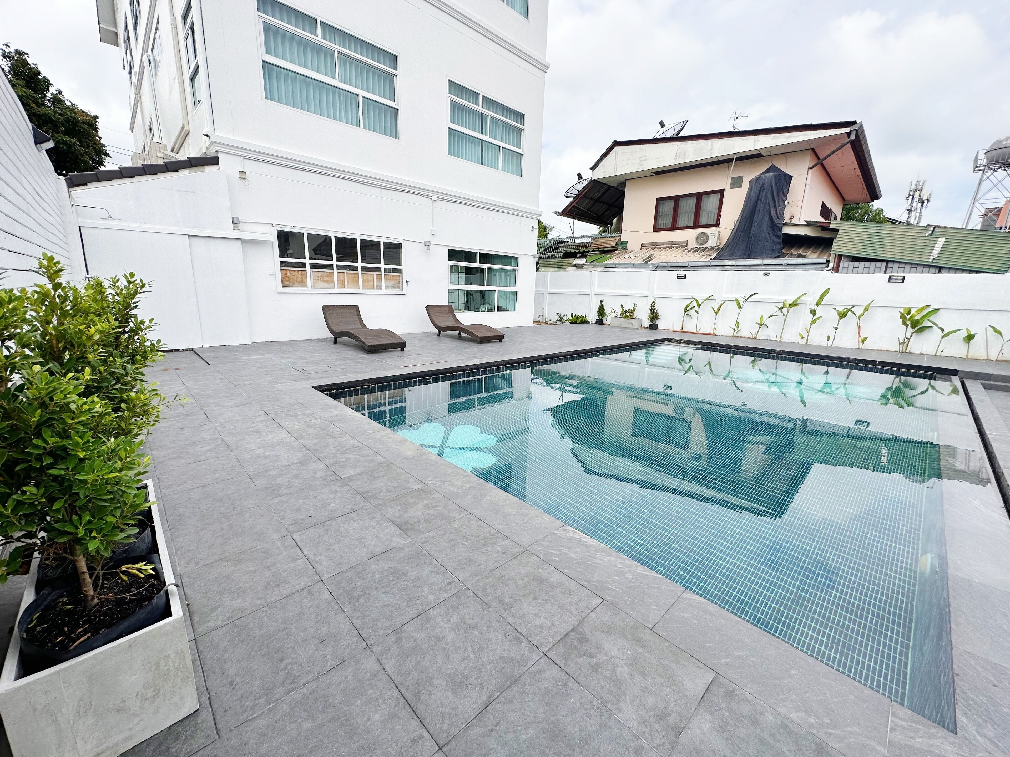 Outdoor pool, open 8:30 AM to 8:00 PM, pool loungers