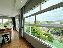 Deluxe Room, 1 King Bed, Non Smoking, Pool Access | 1 bedroom, minibar, desk, laptop workspace