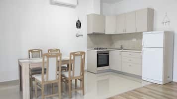 Fridge, stovetop, cookware/dishes/utensils