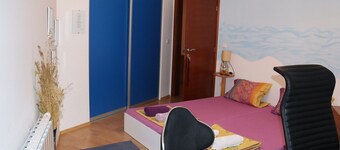 Double room Uma with shared bathroom