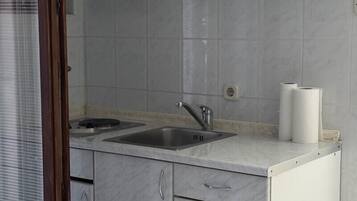 Fridge, stovetop, cookware/dishes/utensils