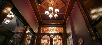 Boutique 1 BR King Guest Room in historic Jacksonville, OR. Features a plush King bed, Nespresso machine, and charming Inn details. Perfect for a comfortable, walkable downtown escape.