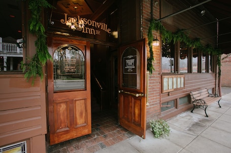 Exterior detail. Jacksonville Inn Room #8: King Suite. Prime downtown location for festivals and dining. Comfortable king bed, Nespresso coffee, and historic boutique elegance
