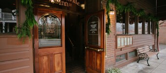 Jacksonville Inn Room #8: King Suite. Prime downtown location for festivals and dining. Comfortable king bed, Nespresso coffee, and historic boutique elegance