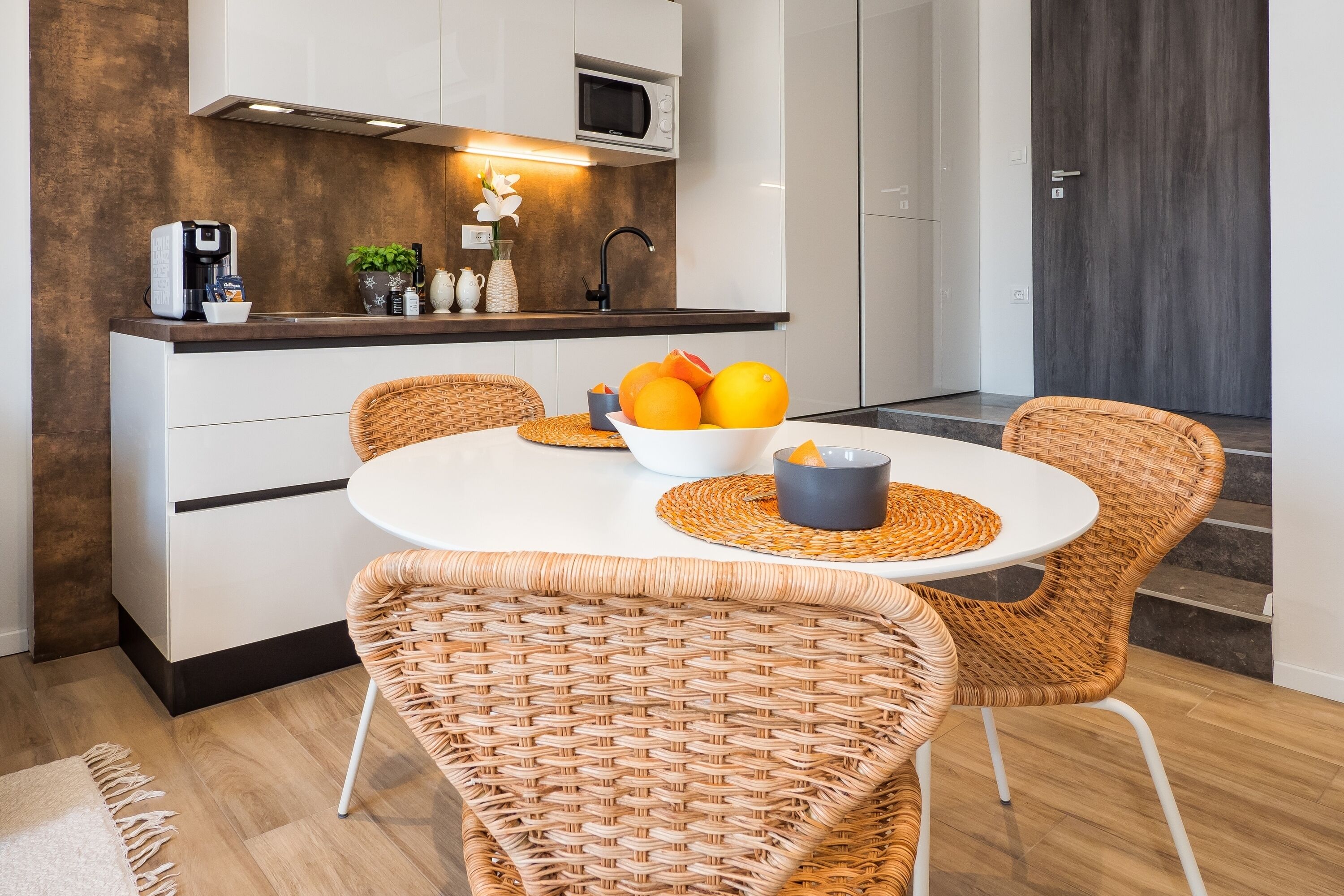 Fridge, microwave, coffee/tea maker, cookware/dishes/utensils