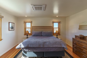 1 bedroom, desk, iron/ironing board, travel crib
