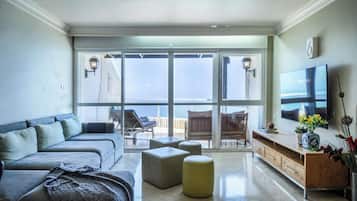 Apartment | Living area | 65-inch Smart TV with digital channels, TV