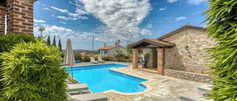 Seasonal outdoor pool, a heated pool