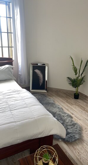 1 غرفة نوم ومكواة/لوح كي وواي فاي وملاءات أسرّة