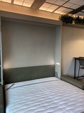 2 slaapkamers, een strijkplank/strijkijzer, gratis wifi, beddengoed