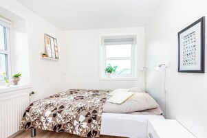 Apartment | 1 bedroom, blackout drapes, iron/ironing board, cribs/infant beds