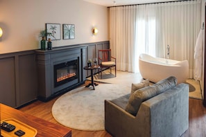 Deluxe Chalet | Living area | Flat-screen TV