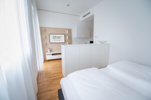 Senior Suite | In-room safe, desk, laptop workspace, blackout drapes