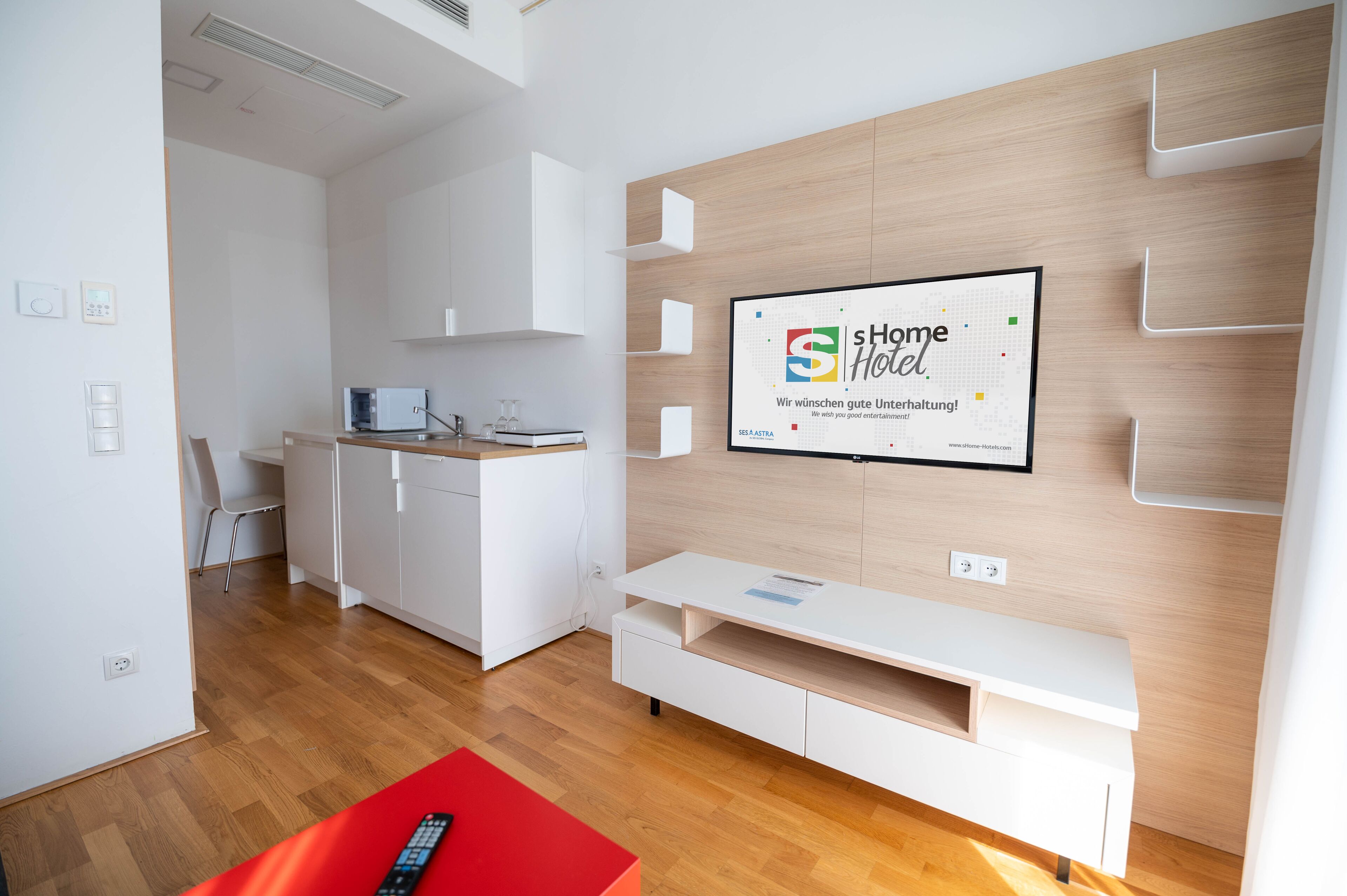 junior suite | 1 bedroom, in-room safe, desk, laptop workspace