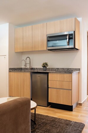 Mini-fridge, microwave, blender, cookware/dishes/utensils