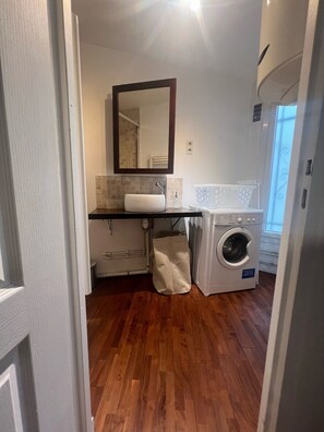 Hair dryer, towels, soap, shampoo