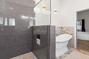 Bathtub, hair dryer, towels