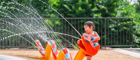 Seasonal outdoor pool, open 10:30 AM to 6:30 PM, pool umbrellas