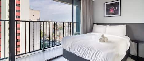 1 bedroom, desk, bed sheets