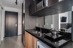 Studio Tradition | Salle de bain | Douche, douche à « effet pluie », serviettes fournies, savon