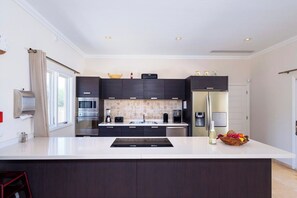Modern Elegance: Cook in Style with Stainless Steel Appliances in Our Sleek Kitchen! ✨