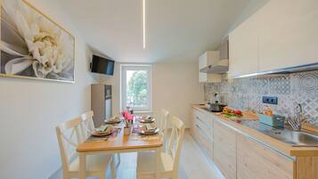 Standard Apartment, 2 Bedrooms (Magnolia Apt - Palazzo Palermo 1817) | Private kitchen | Fridge, microwave, stovetop, dishwasher