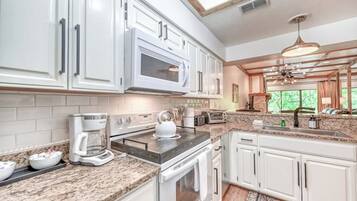 Condo, Multiple Beds, Pool Access (371 W Lincoln C111) | Private kitchen | Coffee/tea maker