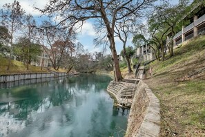 Condo, Multiple Beds, Pool Access (371 W Lincoln C111) | Water view - Luxurious Riverfront Condo Just 1 Blk to Schlitterbahn! (New Braunfels)