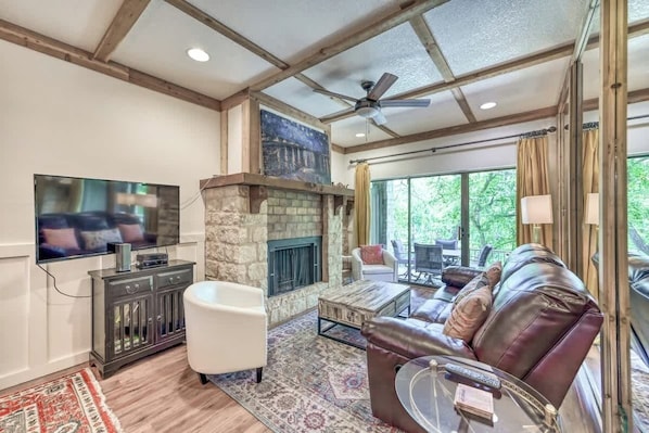Condo, Multiple Beds, Pool Access (371 W Lincoln C111) | Living area | TV, fireplace