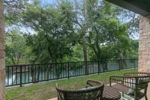 Condo, Multiple Beds, Pool Access (371 W Lincoln C111) | View from room - Luxurious Riverfront Condo Just 1 Blk to Schlitterbahn! (New Braunfels)