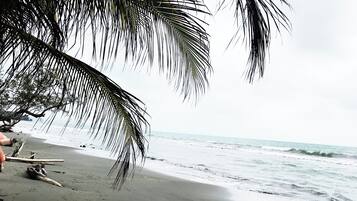 Private beach, black sand, beach massages, beach yoga