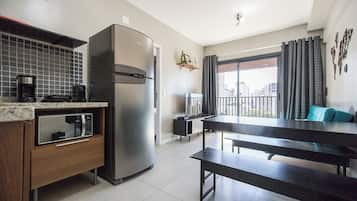 Estudio básico (418861) | Área de sala de estar | Smart TV y servicios de streaming