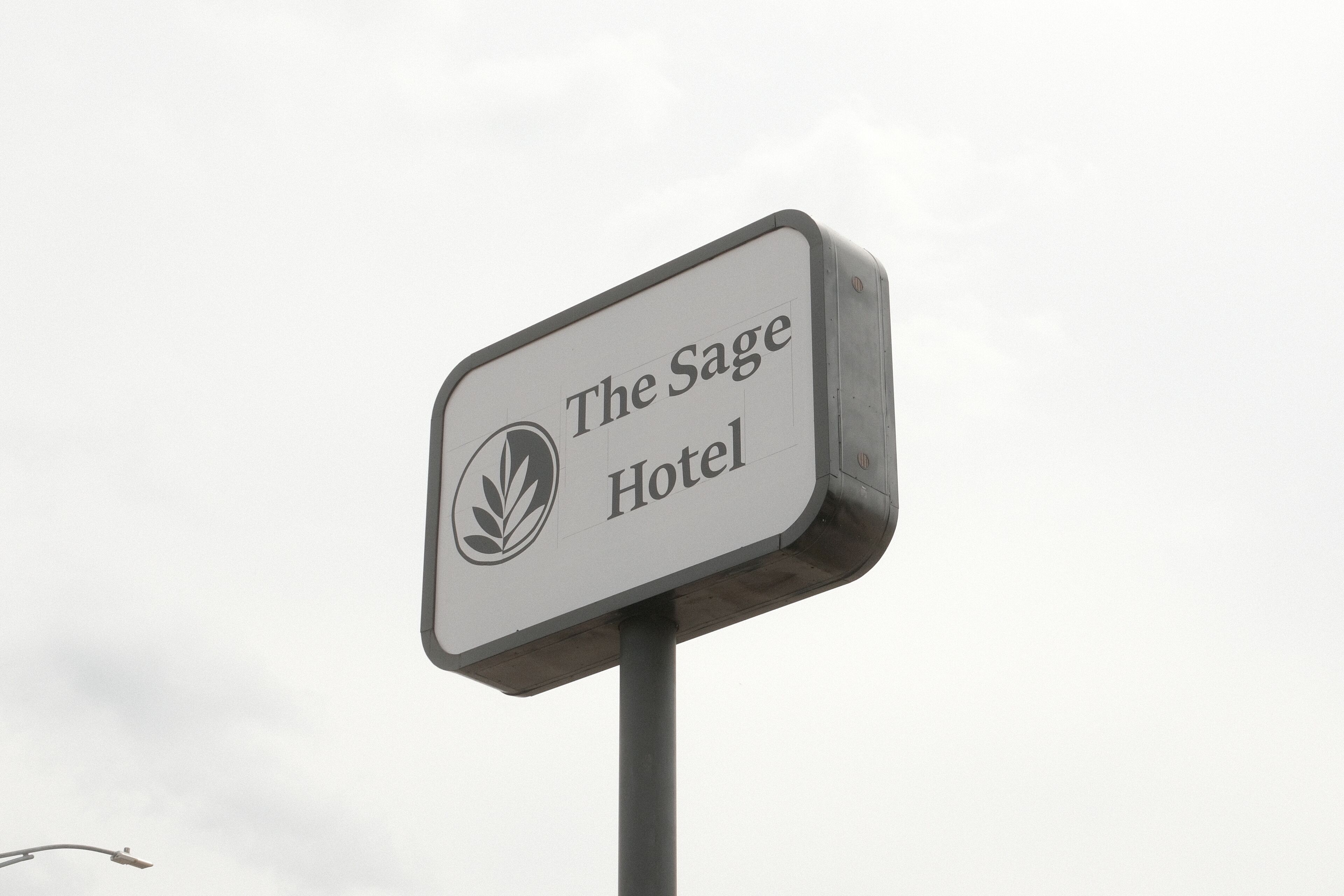 A sign for The Sage Hotel.