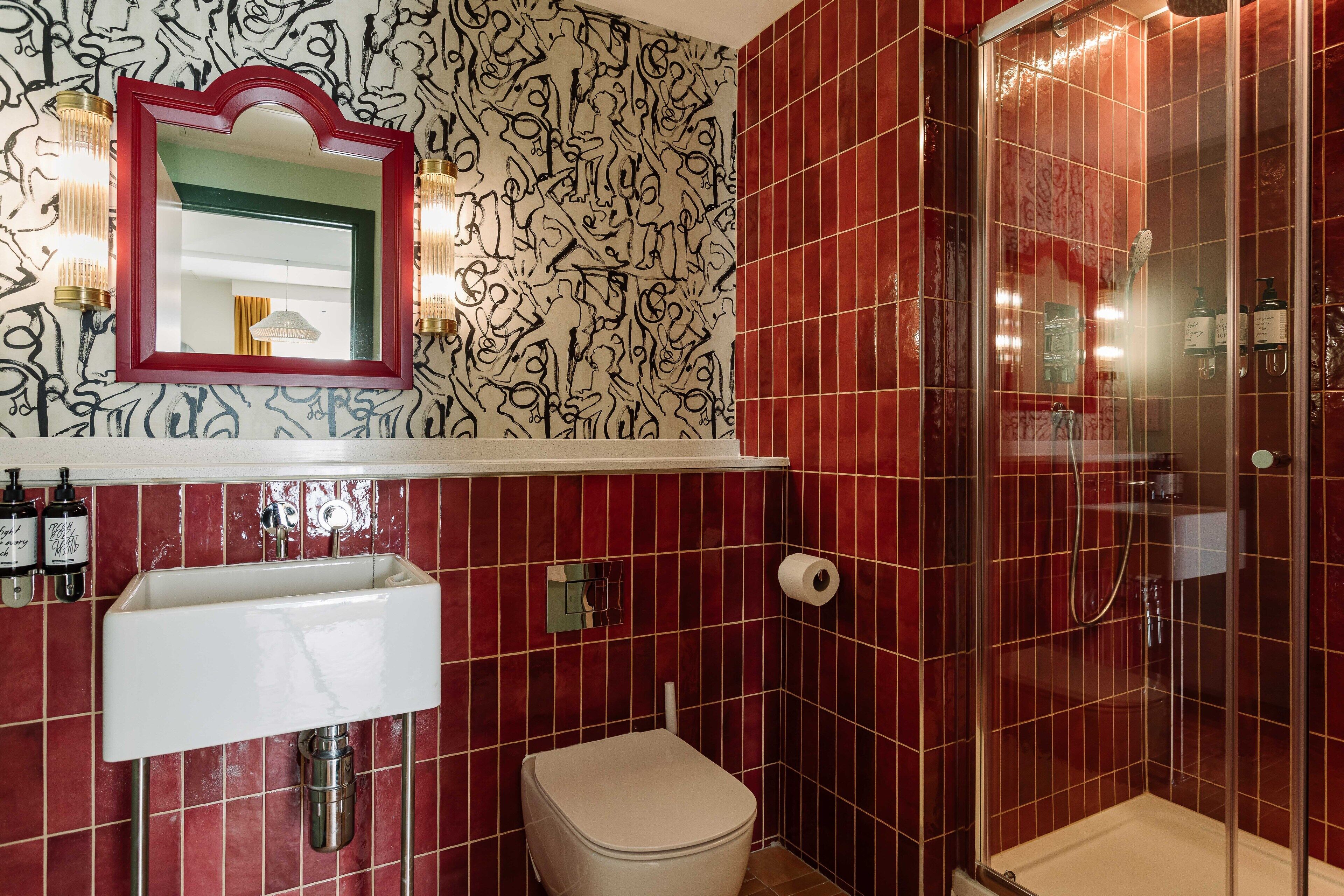 suite | bathroom | shower, designer toiletries, hair dryer, towels