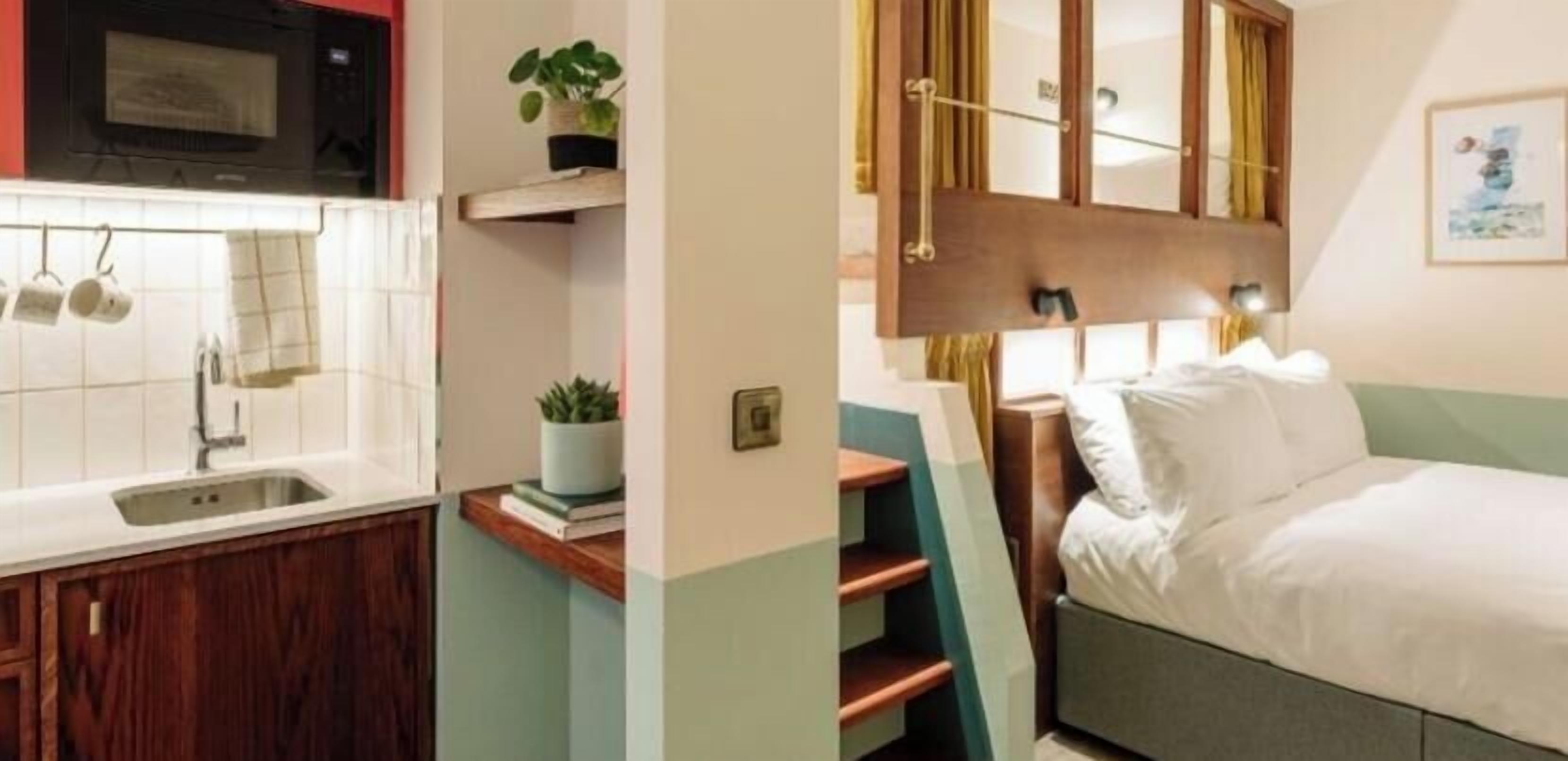 Loft | Premium bedding, in-room safe, laptop workspace, blackout drapes