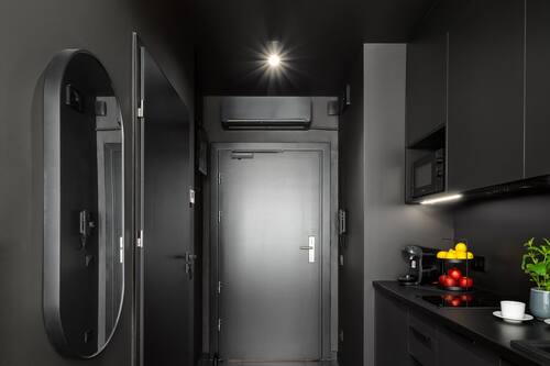 Estudi en suite Deluxe | Cuina privada | Frigorífic, microones, placa de cuina i rentaplats