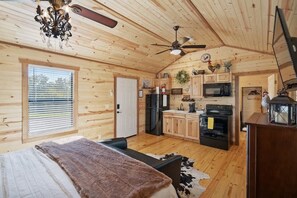 Cabin, 1 King Bed, Kitchen (411 E Main St #4) | 1 bedroom, individually decorated, individually furnished, free WiFi