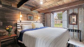 Cabin, Multiple Beds, Patio (3499 W US Hwy 290) | 2 bedrooms, individually decorated, individually furnished, bed sheets