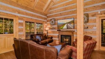 Cabin, Multiple Beds, Hot Tub | Living area | 50-inch flat-screen TV with cable channels, TV, fireplace
