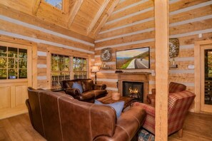 Cabin, Multiple Beds, Hot Tub | Living area | 50-inch flat-screen TV with cable channels, TV, fireplace