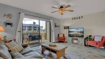 Condo, Multiple Beds, Pool Access (2107 Bayhouse Dr) | Living area | Fireplace