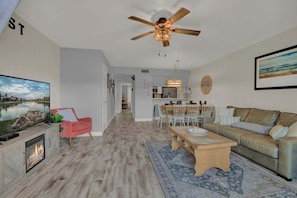 Condo, Multiple Beds, Pool Access (2107 Bayhouse Dr) | Living area | Fireplace - Fisherman Friend! - Coastal Condo - Views Await! (Rockport)