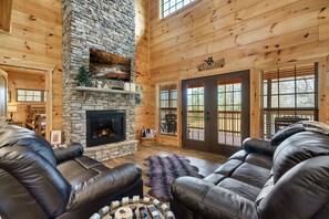 Cabin, Multiple Beds, Hot Tub | Living area | 65-inch flat-screen TV with cable channels, TV, fireplace