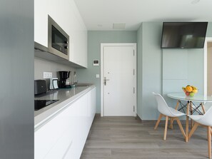 Fridge, microwave, coffee/tea maker, electric kettle