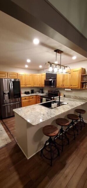 Fridge, microwave, oven, stovetop - On the Hooch in HELEN Hot Tub Fireplace Dog Friendly Walk to all the fun! (Helen)