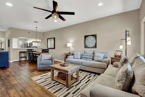 Condo, Multiple Beds, Pool Access (371 W Lincoln C216) | Living area | Fireplace - Luxury Riverfront Condo 1 BLK to Schlitterbahn! (New Braunfels)